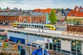 Tram driving through central Helsingor near train station Royalty Free Stock Photo