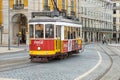 Tram driving through Commerce Square in downtown Lisbon Royalty Free Stock Photo