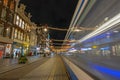 Tram driving on Damrak in christmas time in Amsterdam Netherlands Royalty Free Stock Photo