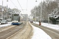 Tram driving in snowy Amsterdam Netherlands Royalty Free Stock Photo