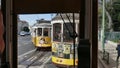 Tram of Lisbon.Looking through the windshield of the driver`s cab on a preceding and oncoming historical tram