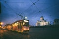 Tram passing Helsinki Senate Square during sunset with Helsinki Royalty Free Stock Photo