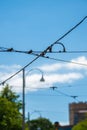 Tram power lines hanging in the sky.. Royalty Free Stock Photo
