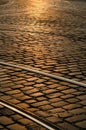 Tram rails on paved street at sunset,Prague Royalty Free Stock Photo