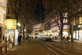 Tram rushes through the evening streets.