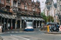 Tram speeding up Raadhuisstraat street in the historic centre of Amsterdam