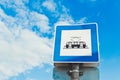 Traffic sign. Tram station sign on a street in the city against a blue sky