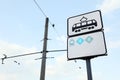 Tram stop sign against blue sky. Space for text Royalty Free Stock Photo