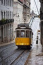 The 28 tram in a street of the Chiado neighborhood in the city of Lisbon, Portugal