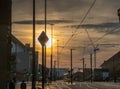 Tram and tramlines in Manchester, UK, with setting sun a Royalty Free Stock Photo