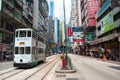 A tram travels along Hennessy Road in downtown Causeway Bay, Hong Kong Royalty Free Stock Photo