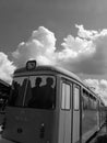 Tram under the cloudy sky