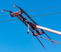 Tram wires against the blue sky Royalty Free Stock Photo