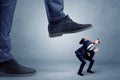 Trampled small businessman in suit Royalty Free Stock Photo