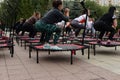 Trampoline training on the street. Orenburg, Russia, 02.08.19. sports performances, jumps. Outdoor fitness training.