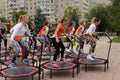 Trampoline training on the street. Orenburg, Russia, 02.08.19. sports performances, jumps. Outdoor fitness training.