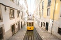 Trams in Lisbon. Yellow funicular tram in Lisbon old town. Tourist attraction Royalty Free Stock Photo