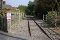 Tramway line with raised iron tramway tracks Royalty Free Stock Photo