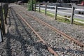 Tramway line with raised iron tramway tracks Royalty Free Stock Photo