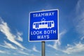 Tramway safety blue sign look both ways