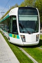 Tramway in the sun with green grass, Paris, France Royalty Free Stock Photo