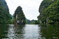 Trang An, Ninh Binh, Vietnam. June 9, 2019: People taking Boat tour to king kong skull island. Trang An is UNESCO World