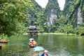 Trang An, Ninh Binh, Vietnam. June 9, 2019: People taking Boat tour to king kong skull island. Trang An is UNESCO World