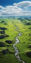 Tranquil Aerial View Of Organic Hills, River, And Clouds Royalty Free Stock Photo