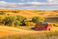 Tranquil autumn scene with a red barn surrounded by golden fields. Royalty Free Stock Photo