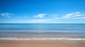 Tranquil Beachscape with a Blue Sky and Gentle Waves Royalty Free Stock Photo