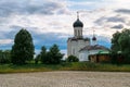 Evening melancholic sky over the famous Church of the Intercession of the Holy Virgin on the Nerl River. Vladimir region. Russia. Royalty Free Stock Photo