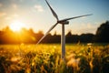 Tranquil blue sky with wind turbine blades in graceful motion over vast landscape Royalty Free Stock Photo