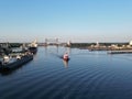 Tranquil body of water with several boats and ships sailing across its surface Royalty Free Stock Photo