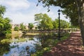 Tranquil Bridge and Tree Reflections in Nature's Waterway Royalty Free Stock Photo