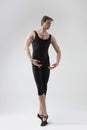 Tranquil Contemporary Ballet Dancer Flexible Athletic Man Posing in Black Tights in Ballanced Dance Pose With Hands in Front