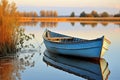 Tranquil dawn solitary wooden boat on lake, reflections in calm water, peaceful nature landscape