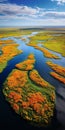 Tranquil Estuary: Majestic River With Vibrant Orange Flowers