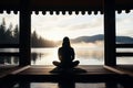 Tranquil female meditating and finding inner peace amongst the serenity of nature