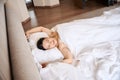 Tranquil female sleeping alone in her suite Royalty Free Stock Photo