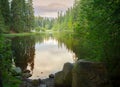 Tranquil forest lake sunset Royalty Free Stock Photo