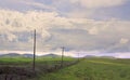 Tranquil grassy landscape with green hills in the background. California Royalty Free Stock Photo