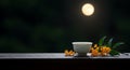 Moonlight tea moment with osmanthus blooms Royalty Free Stock Photo