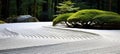 Tranquil japanese zen garden with meticulously raked sand and serene stone arrangements Royalty Free Stock Photo