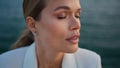 Tranquil lady relaxing sea water close up. Portrait of serene woman enjoy nature Royalty Free Stock Photo