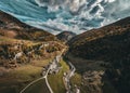 Tranquil landscape in the Alps with wispy clouds dotting the sky in the Swiss alps, Avers