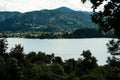 Tranquil landscape featuring Tegernsee Lake with green mountains. Germany.