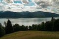 Tranquil landscape featuring Tegernsee Lake with mountains in the distance. Germany. Royalty Free Stock Photo