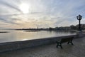 Tranquil morning, empty bench, no people on Bari sea promenade