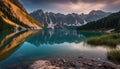 Tranquil mountain lake at sunrise