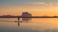 Tranquil Paddle Boarding In Ethereal Island Landscape